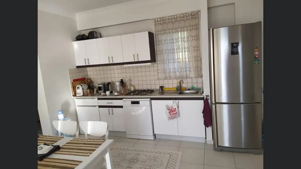 MİLAS GÜLLÜK'TE SUNSET APARTMANLARI SİTESİNDE 2+1 KOMPLE DENİZ HAVUZ MANZARALI DAİRE