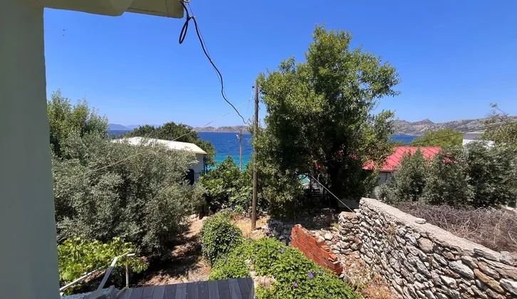 Marmaris Söğütte denize sıfır yapı kayıtlı 2 daireli