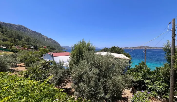 Marmaris Söğütte denize sıfır yapı kayıtlı 2 daireli