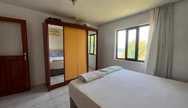 Marmaris Söğütte denize sıfır yapı kayıtlı 2 daireli