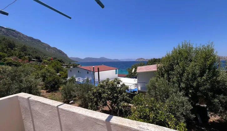 Marmaris Söğütte denize sıfır yapı kayıtlı 2 daireli