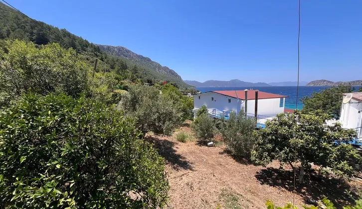 Marmaris Söğütte denize sıfır yapı kayıtlı 2 daireli