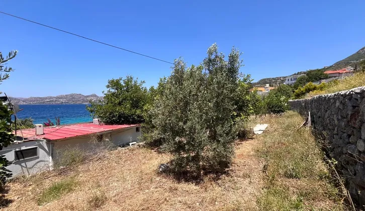 Marmaris Söğütte denize sıfır yapı kayıtlı 2 daireli
