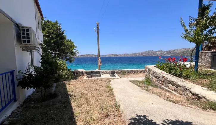 Marmaris Söğütte denize sıfır yapı kayıtlı 2 daireli